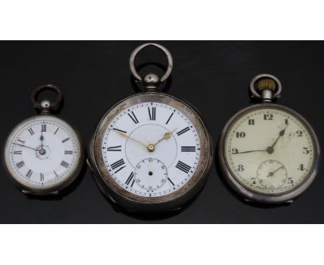 Three silver pocket watches comprising one keyless winding with subsidiary seconds dial and Arabic numerals, one with gold ha