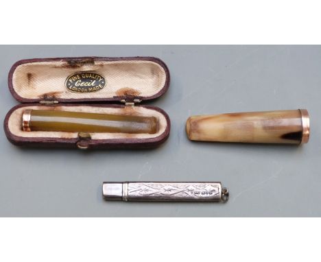 A cheroot holder with a 9ct gold mount, a bone cheroot holder with a yellow metal mount and a hallmarked silver pencil holder