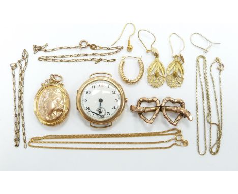 A 9ct gold watch, 9ct gold brooch, locket, chains etc