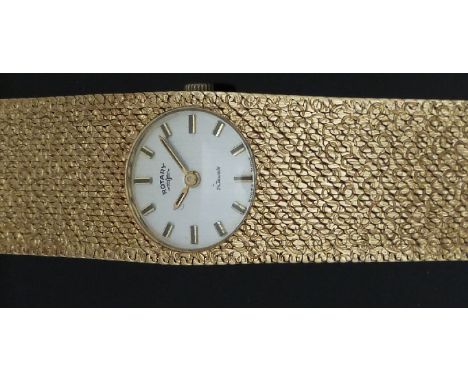 Rotary 9ct gold ladies wristwatch two-tone hands and baton markers, silver dial and 21 jewel calibre 2412 movement, on textur
