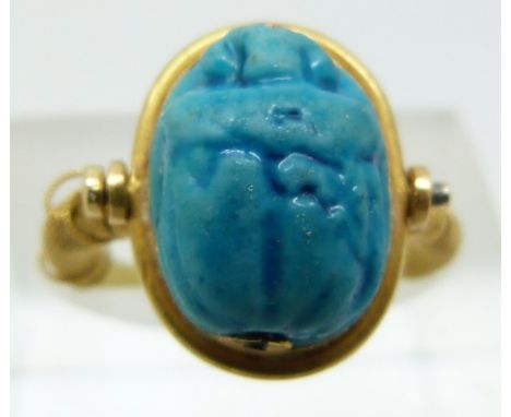 A 19thC Egyptian Revival ring set with a ceramic scarab beetle (size F/G)