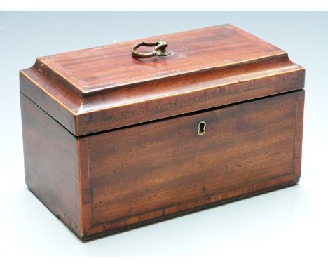 Georgian mahogany tea caddy with inlaid and crossbanded decoration and having three lift out canisters, width 25cm