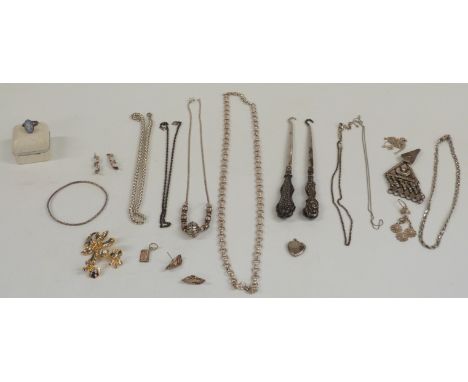 A collection of jewellery including silver necklaces, silver ring, button hooks etc