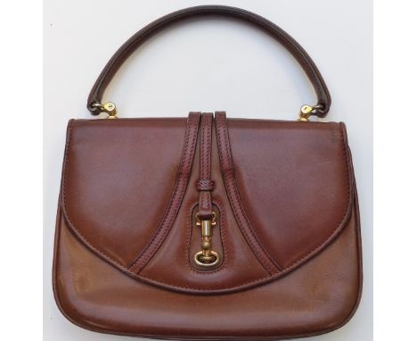 A vintage Gucci brown leather handbag