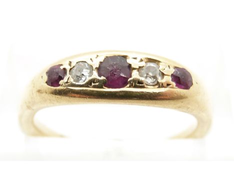 An 18ct gold ring set with diamonds and rubies, in original box (size M)