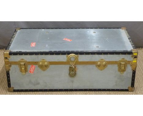 A metal bound and riveted flight case/trunk, H35 x W100 x D50cm
