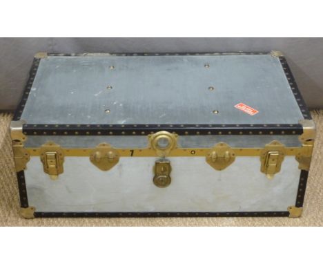 A metal bound and riveted flight case/trunk, H35 x W90 x D50cm