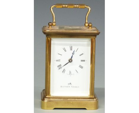 Mathew Norman Swiss made 20thC brass cased carriage clock with corniche style case, white enamelled Roman dial and blued Breg