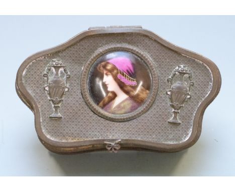 Late 19th or early 20th century gilt metal trinket box with portrait miniature of a lady on porcelain to the lid, overall wid