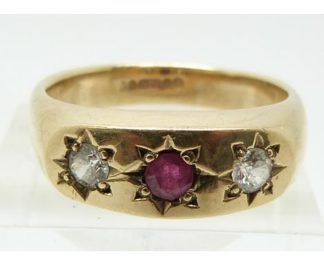 A 9ct gold ring set with a ruby and a cubic zirconia in star settings, 8.8g (size V)