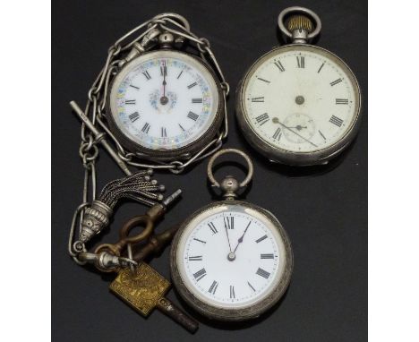 Three silver pocket watches all with black hands and Roman numerals, white enamel dials and engraved cases, one with inset su