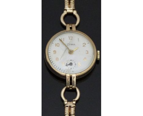 Cyma 9ct gold ladies wristwatch with inset subsidiary seconds dial, gold hands and Arabic numerals, cream dial and signed 17 