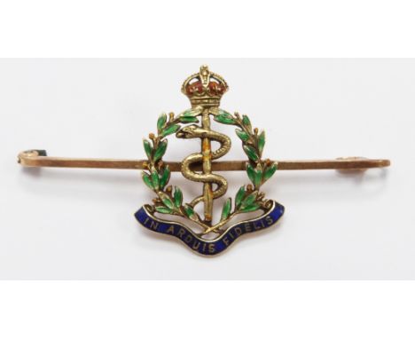 A 15ct gold military brooch "In Arduis Fidelis" set with enamel