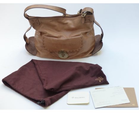 Mulberry leather handbag in light tan finish with antique brass coloured fittings, with care label, customer service label an