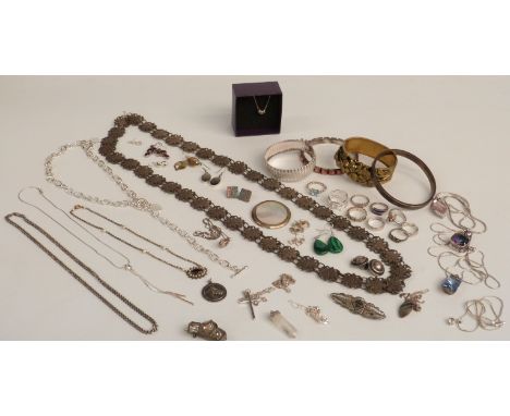 A collection of silver jewellery including flapper bangle, silver chains, pendants, earrings, silver rings, horse racing pend