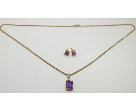 A 9ct gold necklace set with an amethyst and a pair of similar earrings&nbsp;