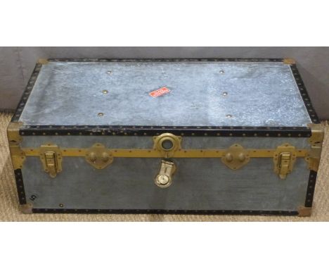 A metal bound and riveted flight case/trunk, H35 x W100 x D50cm