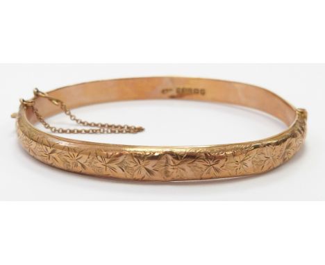 Victorian 9ct gold bangle with engraved foliate decoration, 7.8g&nbsp;