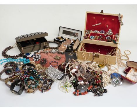 A collection of costume jewellery including beads, marcasite brooch, bracelets, vintage and diamanté brooches etc&nbsp;