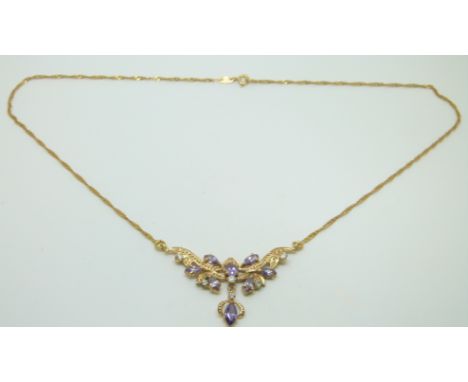A 9ct gold necklace set with amethysts and cubic zirconia, 7.7g