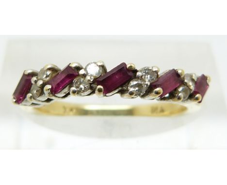 An 18ct gold half eternity ring set with rubies and diamonds (size K)