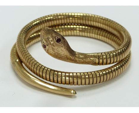 A 9ct gold snake bracelet set with ruby eyes, Birmingham 1978