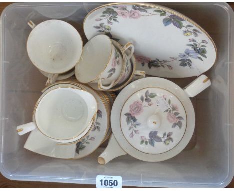 A Royal Worcester bone china part tea set including teapot, milk jug, cups and saucers, etc.