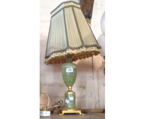 A vintage onyx table lamp with gilt metal fittings - sold with shade