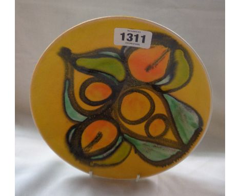 A vintage Poole Pottery plate decorated in 'Aegean' pattern