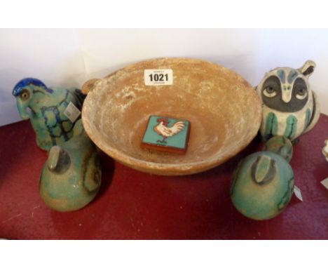 A quantity of raku Studio Pottery animal figurines with turquoise glaze finish - sold with a terracotta bowl and a small tile