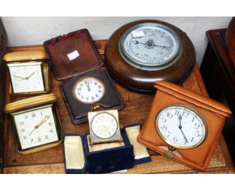 A vintage bi-folding cased Zenith brass cased travelling alarm clock - sold with a Swiza and a Smiths vintage similar, also t