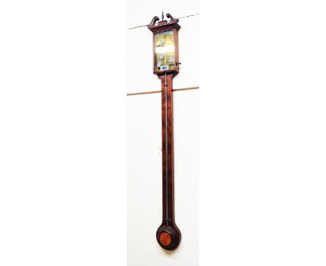 A reproduction inlaid mahogany cased stick barometer with brass dial marked for Thomas Wright and with thermometer tube and m