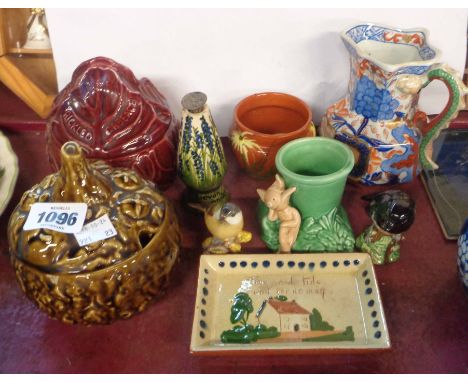 A quantity of ceramics including SylvaC face pots and vase, Beswick and Royal Worcester birds, Torquay ware, Mason's Ironston