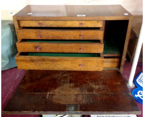 A large vintage engineer's tool chest with internal drawers and lock in front slide with key