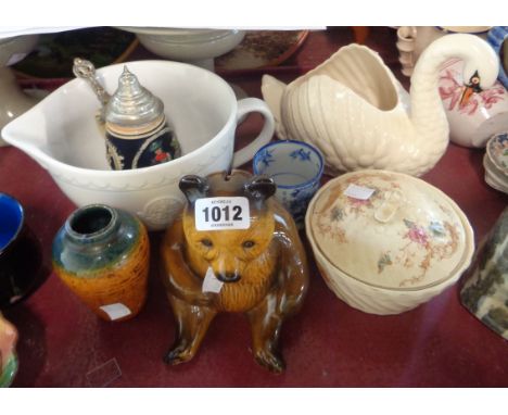 A quantity of ceramics including a Devonshire Potteries Dartmouth swan planter, bear form money box, Kirstie Allsopp branded 