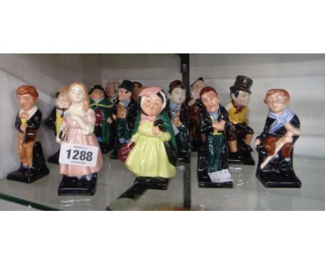 Thirteen ceramic figures including Royal Doulton, bone china and Dickens examples