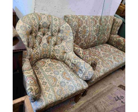 A late Victorian cottage armchair, set on pitch pine legs with brass casters - sold with a 1.39m early 20th Century box frame