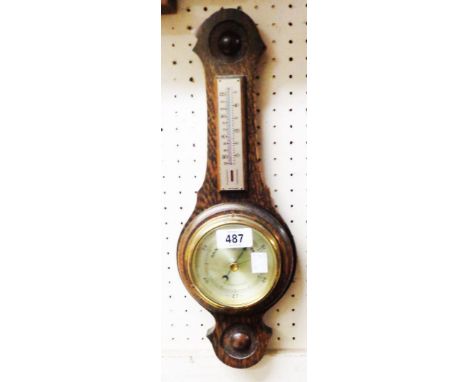 A 20th Century small polished oak framed banjo barometer/thermometer with aneroid works