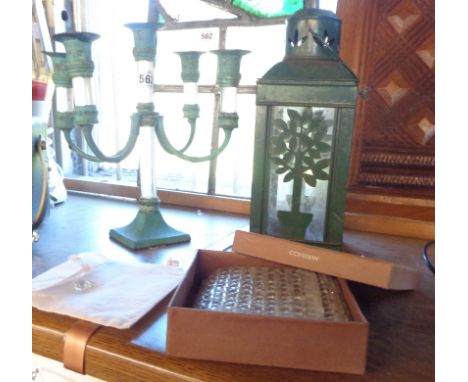 A modern candelabrum with glass columns and antiqued finish - sold with a tea light lantern and a set of beaded coasters