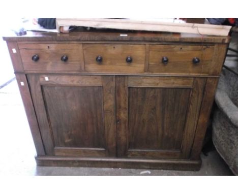 A 1.27m Victorian rosewood chiffonier with three short drawers and double panelled cupboard under, set on plinth base