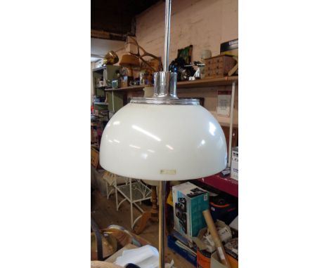 A vintage Italian Guzzini mushroom standard lamp, with rise and fall opaque perspex shade on a chrome column - crack to shade