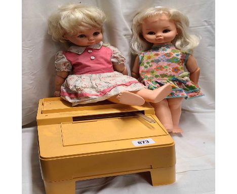 A 1970's Palitoy Katie Kopycat doll with original dress and pantograph desk - sold with another similar doll