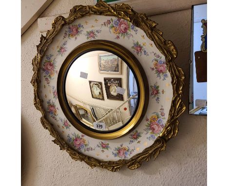 A 1960's wall mirror with Copeland Spode charger backing and convex plate within an applied gilt metal border