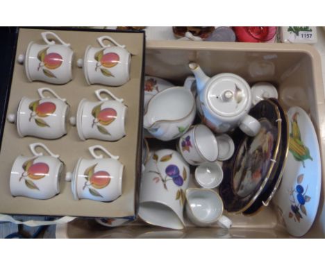 A crate containing a quantity of Royal Worcester oven to tableware decorated in the 'Evesham' pattern including jugs, ramekin