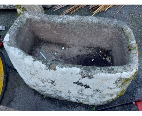 A 1.23m granite water trough with drainage hole to base