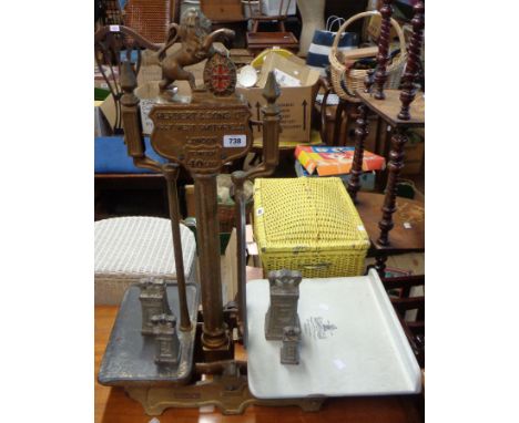A set of early 20th Century Herbert and Sons Ltd. cast iron shop scales with lion and Union Flag finial and ceramic plate - s