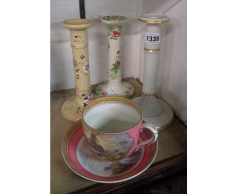 Three 19th Century Pottery candlesticks with hand painted and transfer printed decoration - sold with a Prattware cup and sau