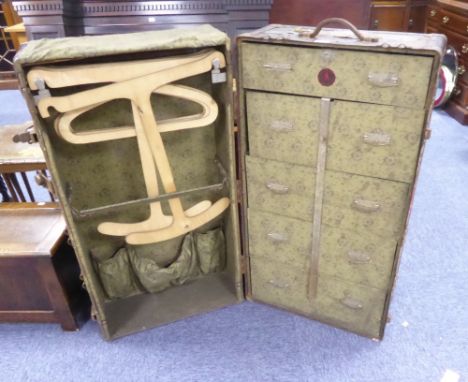 A METAL BOUND WARDROBE TRUNK 
