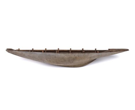 Scale model of a boat approximately 97cm long x 24.5cm wide x 15cm high; together with designs for the vessel (2)   Model: Wi