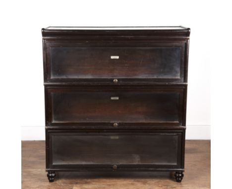 The Globe Wernicke Co Ltd three tier bookcase, with labels 'The Globe Wernicke Co, Ltd, Office and Library Furniture, London'